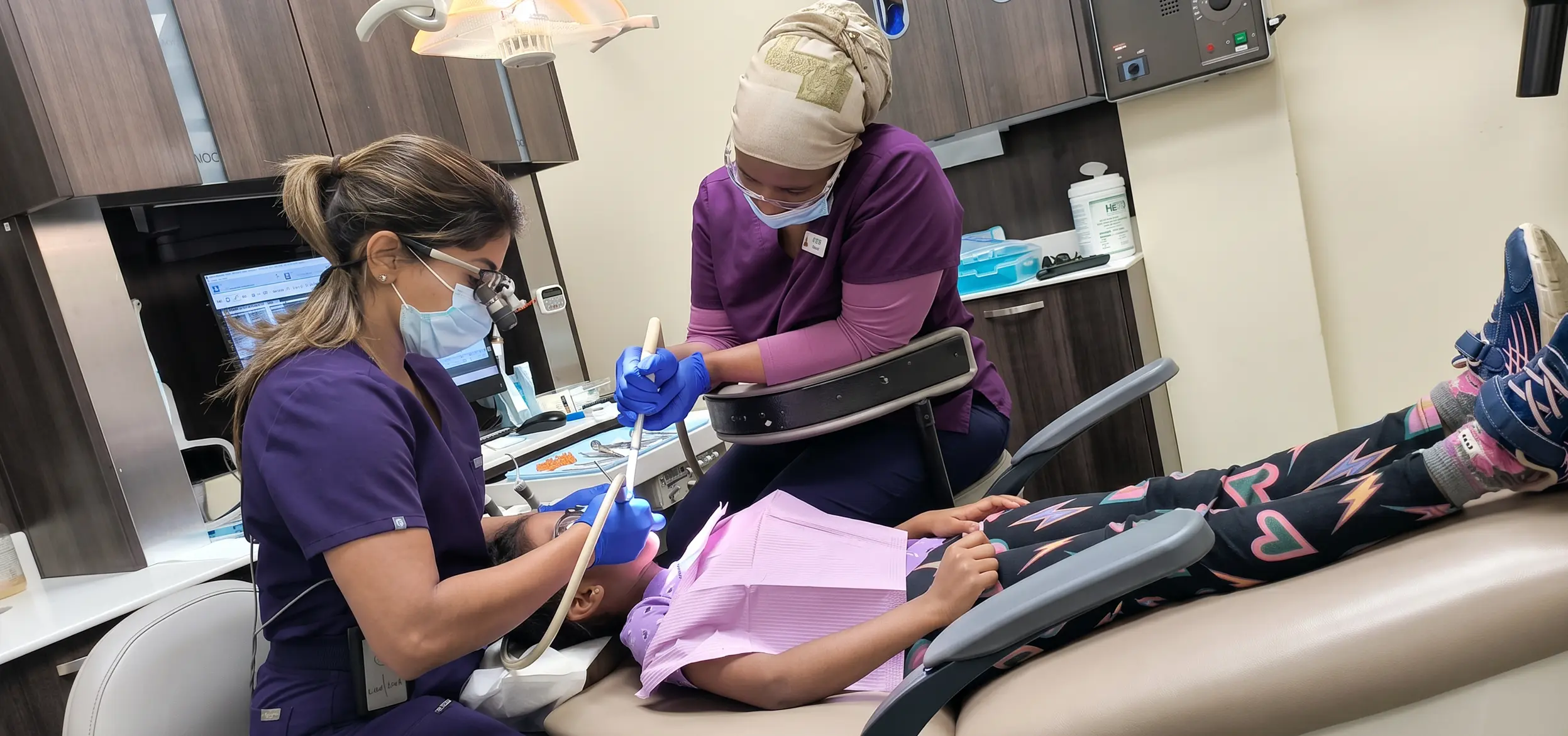 Performing dental cleaning on patient
