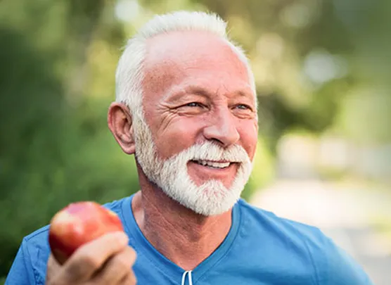 Man eating an apple